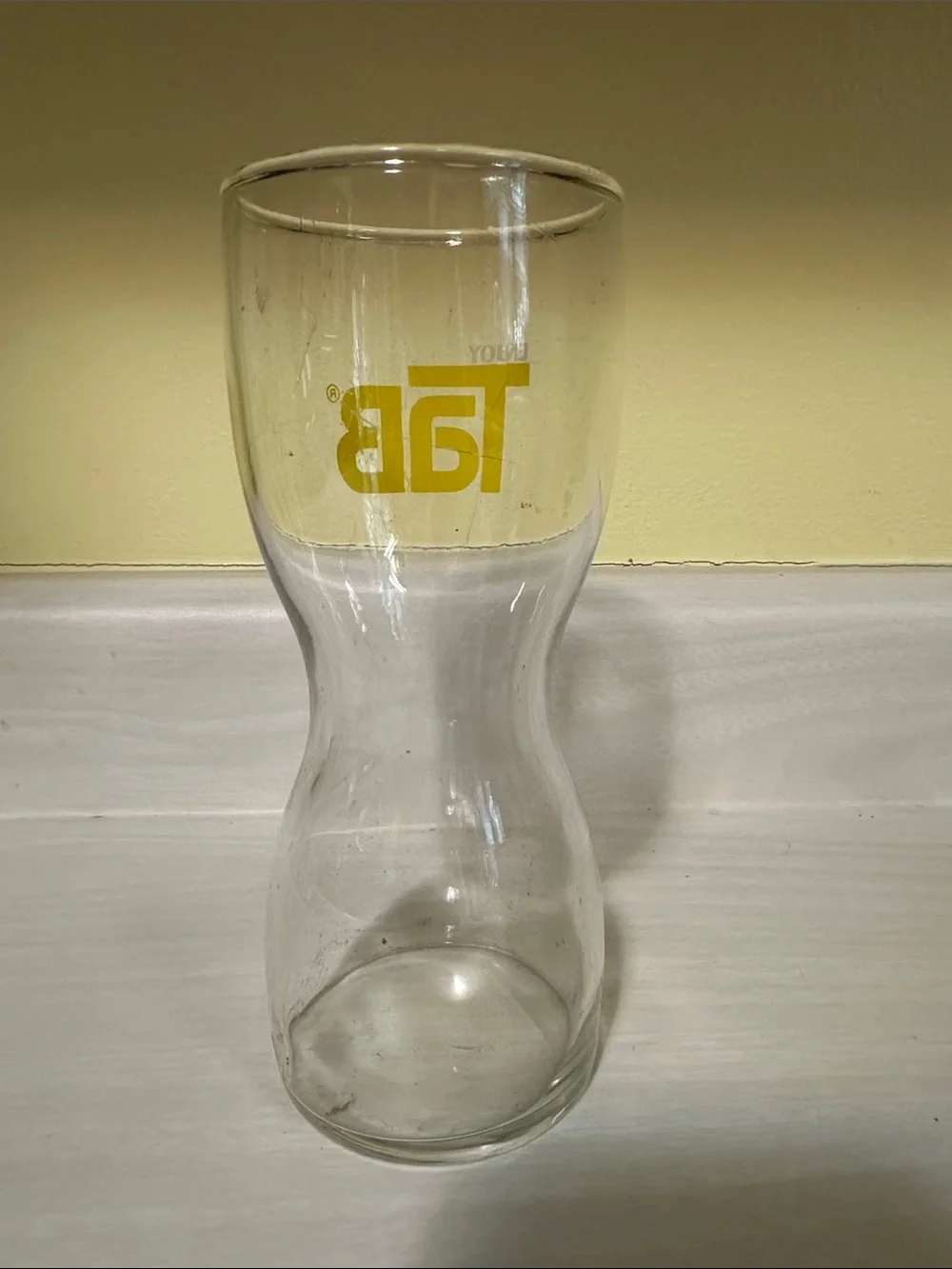 TAB Branded Clear Glass Carafe with Yellow Logo